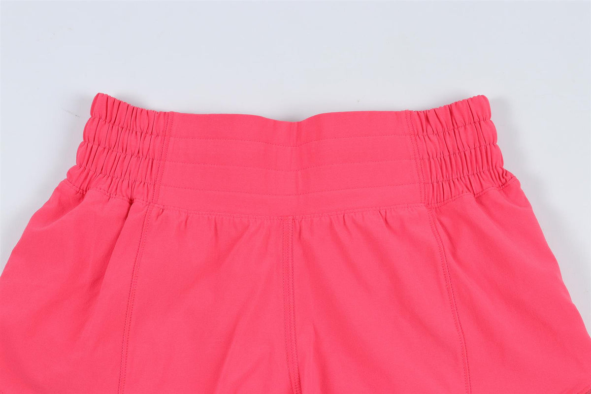 LULULEMON PINK SHORTS US 0 UK 4