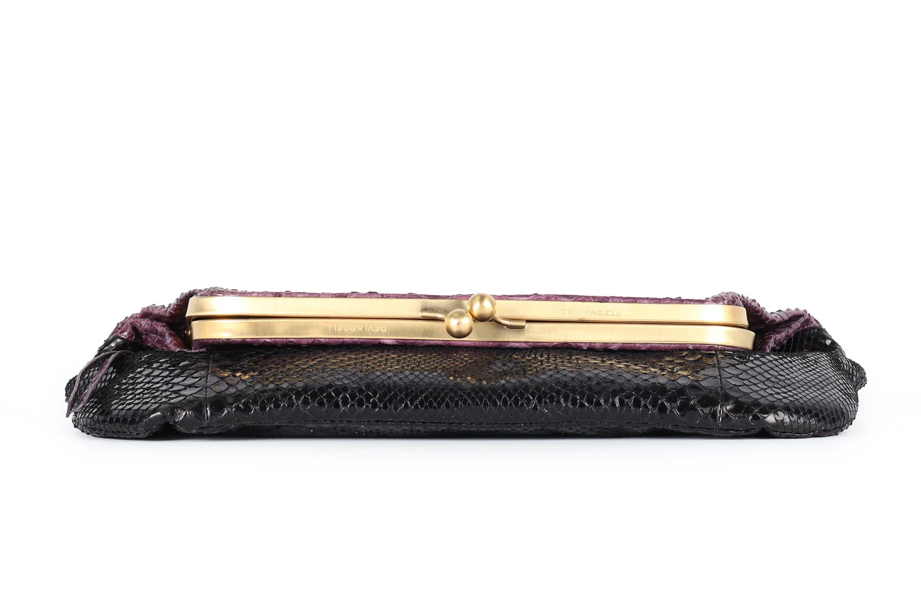 DEVI KROELL PURPLE PYTHON CLUTCH