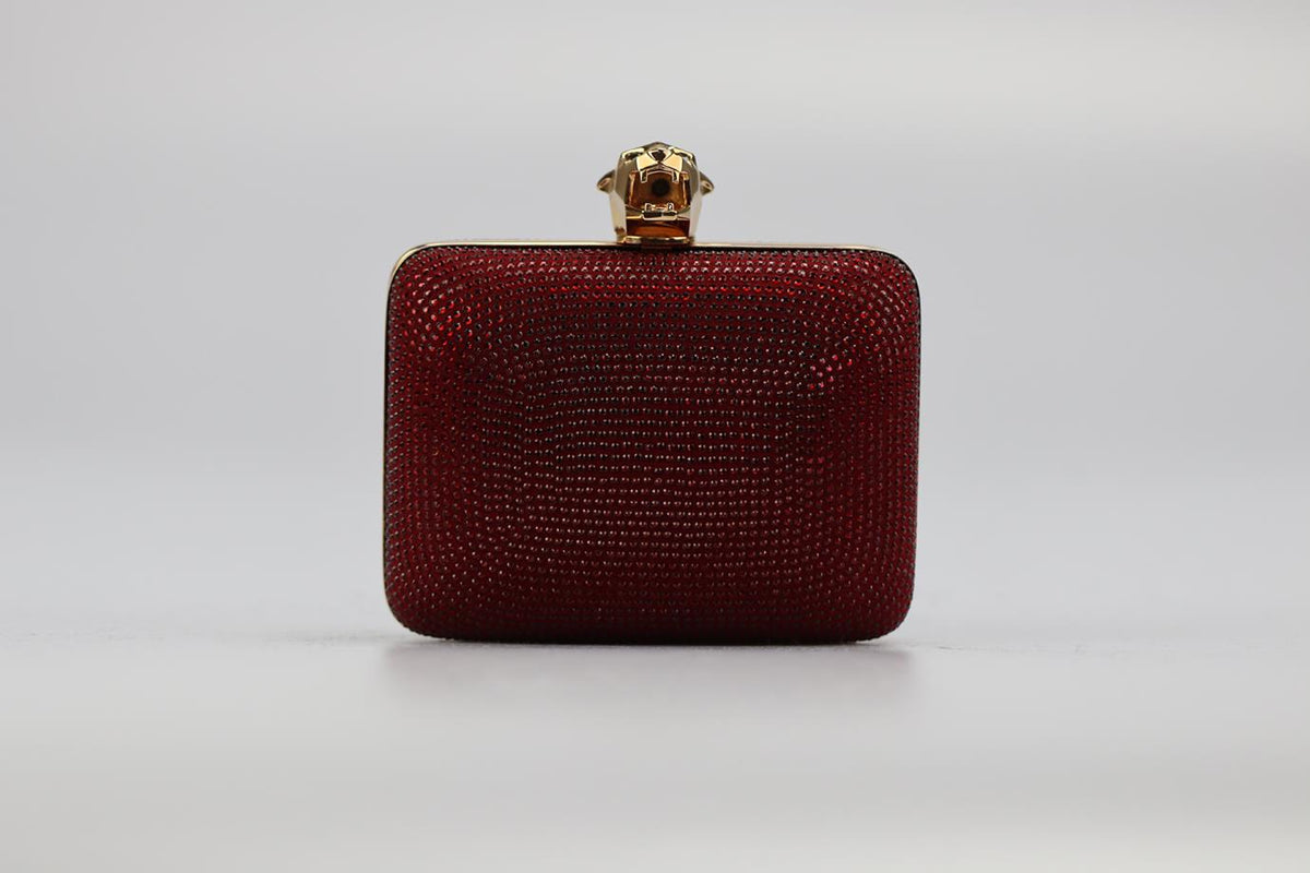STARK CRYSTAL EMBELLISHED SUEDE AND ROSE GOLD TONE CLUTCH