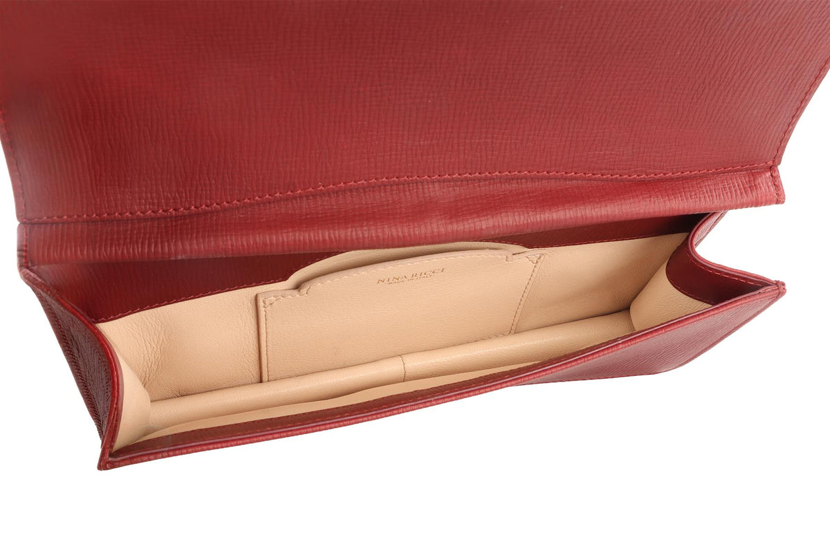 NINA RICCI BURGUNDY LEATHER CLUTCH
