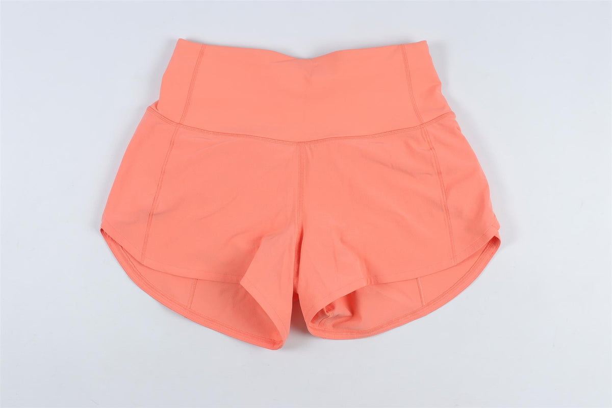 LULULEMON ORANGE SHORTS US 0 UK 4