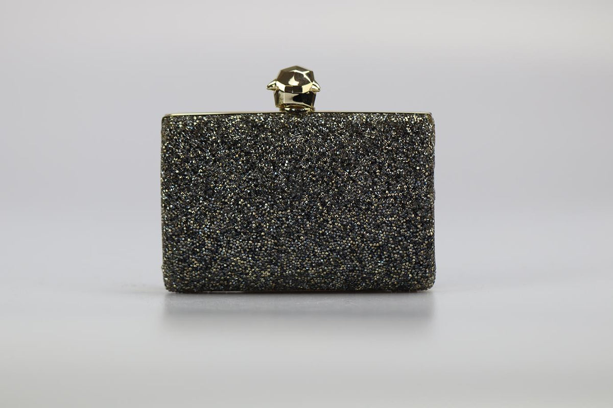 STARK CRYSTAL EMBELLISHED SUEDE AND SILVER TONE CLUTCH