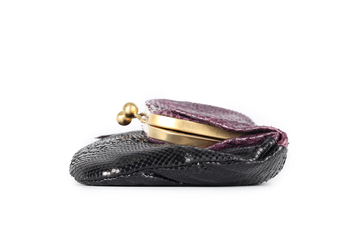 DEVI KROELL PURPLE PYTHON CLUTCH