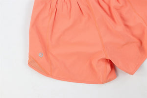 LULULEMON ORANGE JERSEY SHORTS US 0 UK 4