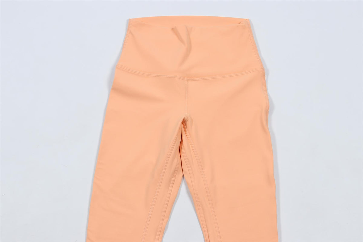 LULULEMON ORANGE LEGGINGS US 4 UK 8