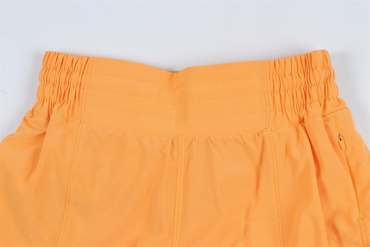 LULULEMON ORANGE SHORTS US 2 UK 6