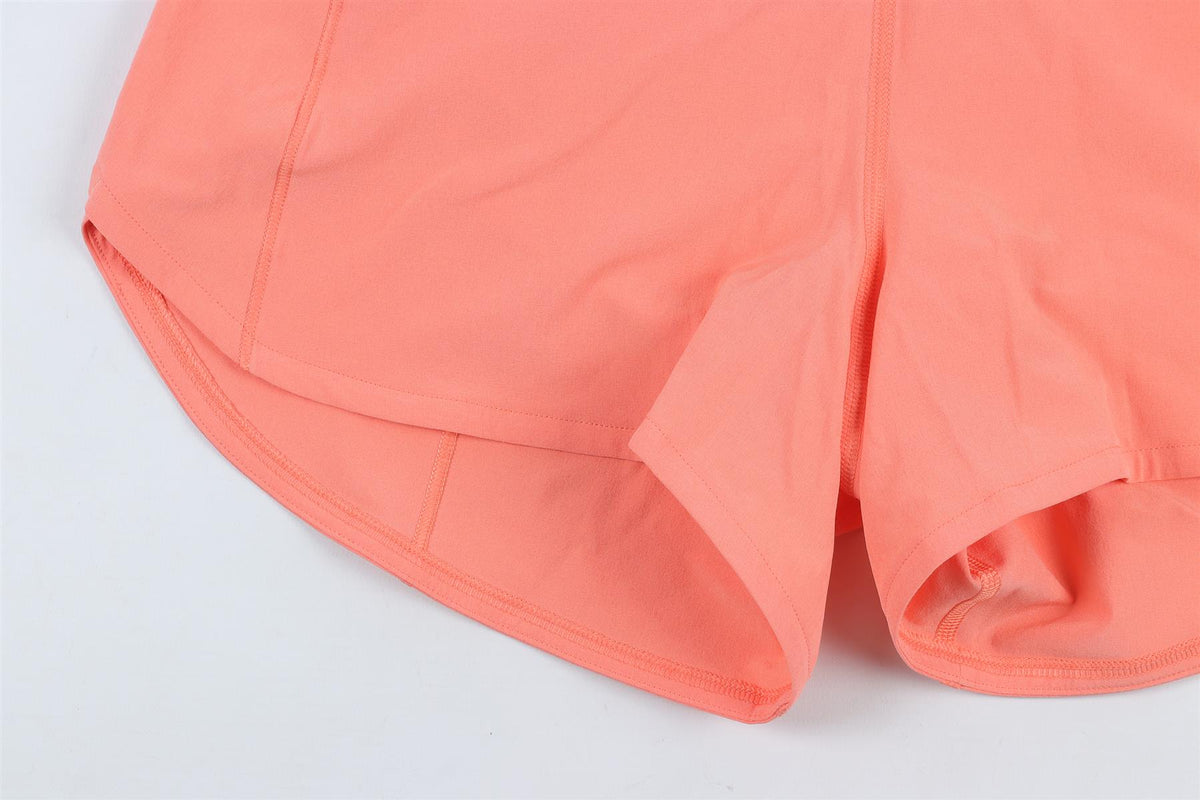 LULULEMON ORANGE SHORTS US 0 UK 4