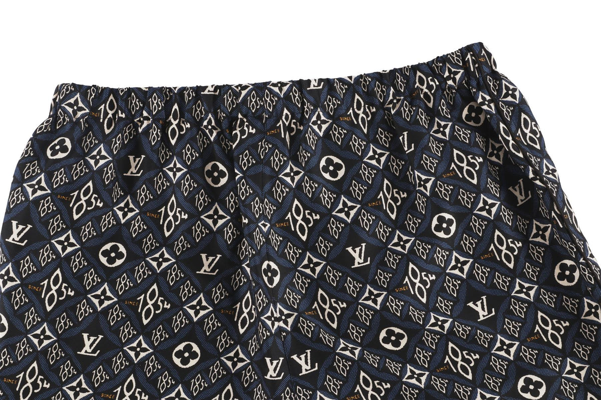 LOUIS VUITTON NAVY SILK SHORTS FR 40 UK 12