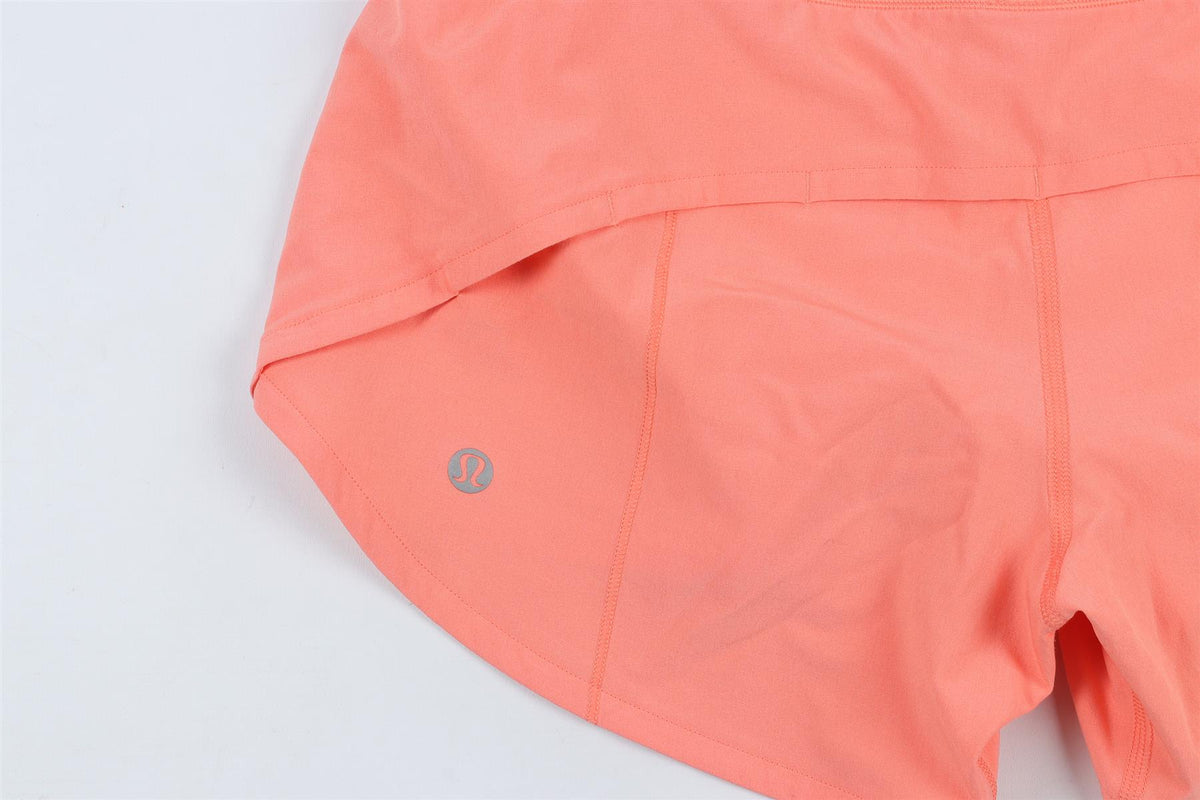 LULULEMON ORANGE SHORTS US 0 UK 4