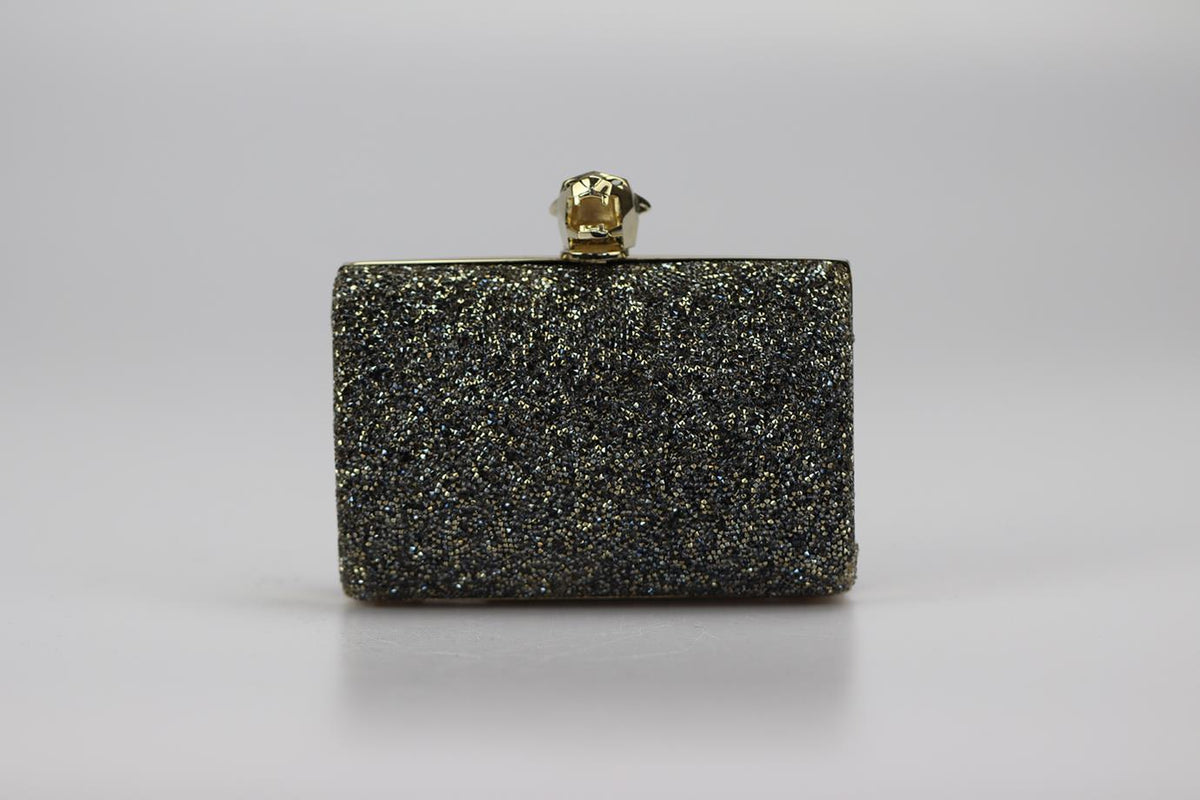 STARK CRYSTAL EMBELLISHED SUEDE AND SILVER TONE CLUTCH