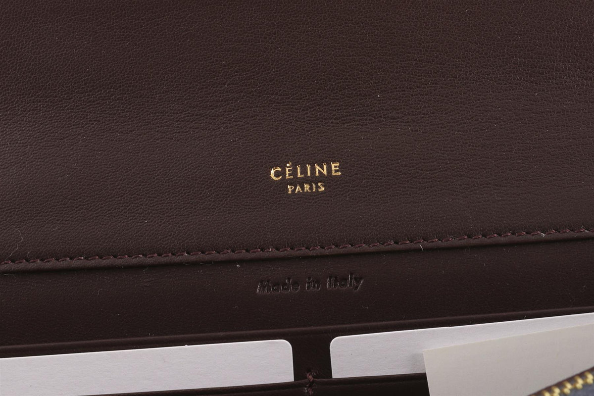 CÉLINE BLUE ORB FELT CLUTCH