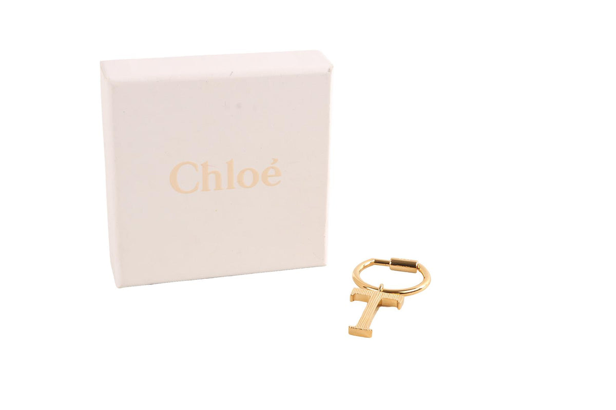 CHLOÉ T INITIAL GOLD TONE KEYCHAIN