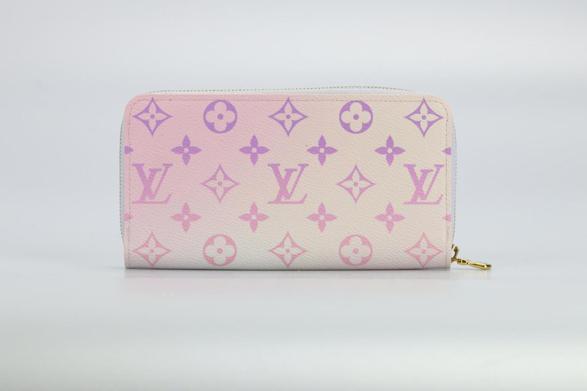 LOUIS VUITTON ZIPPY SPRING IN THE CITY MONOGRAM COATED CANVAS AND LEATHER WALLET