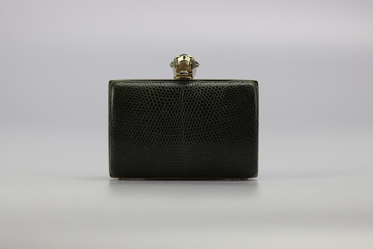 STARK SNAKESKIN AND SILVER TONE CLUTCH