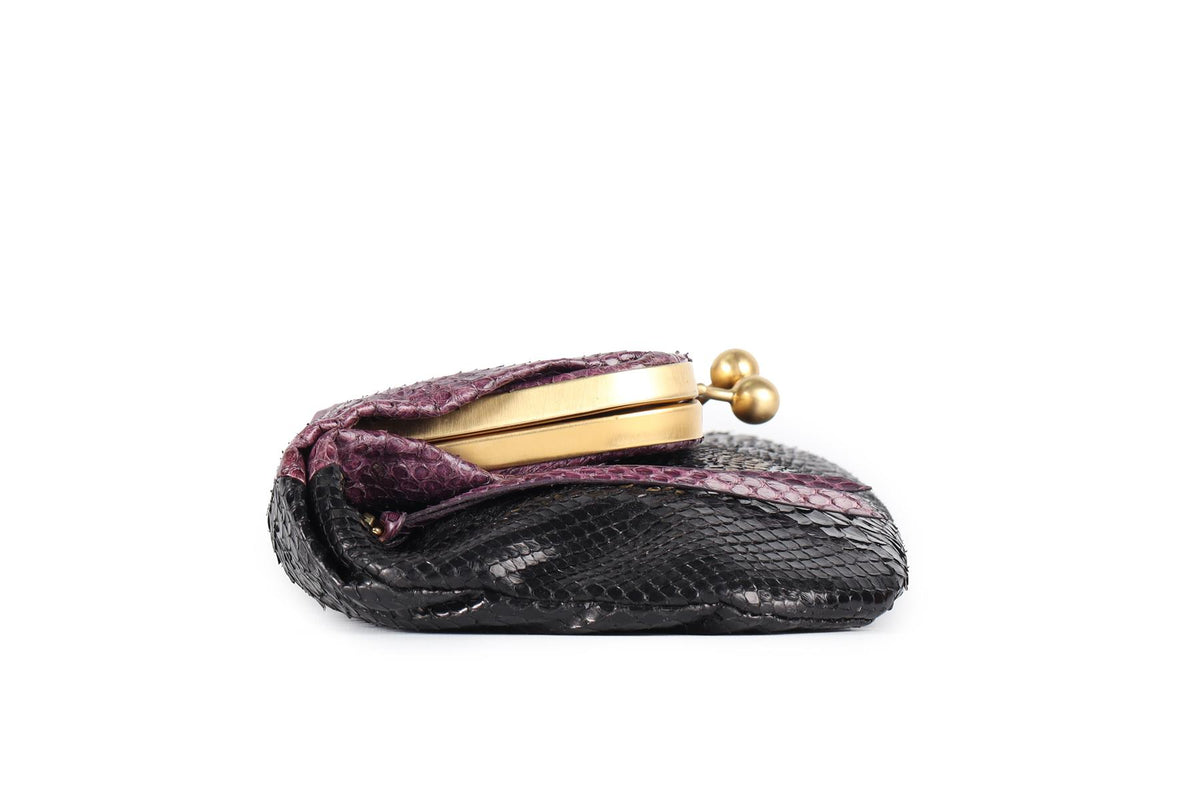 DEVI KROELL PURPLE PYTHON CLUTCH