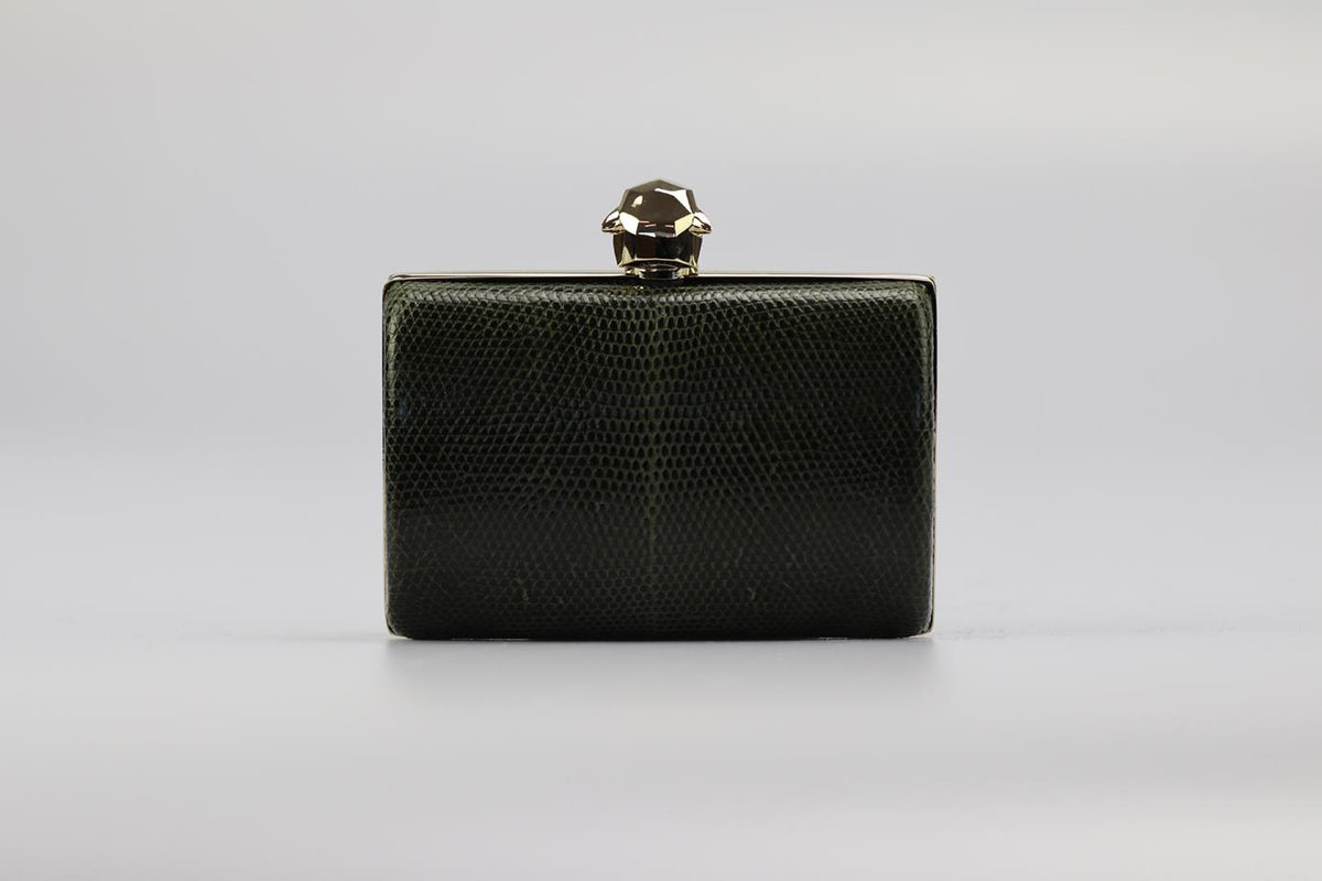 STARK SNAKESKIN AND SILVER TONE CLUTCH