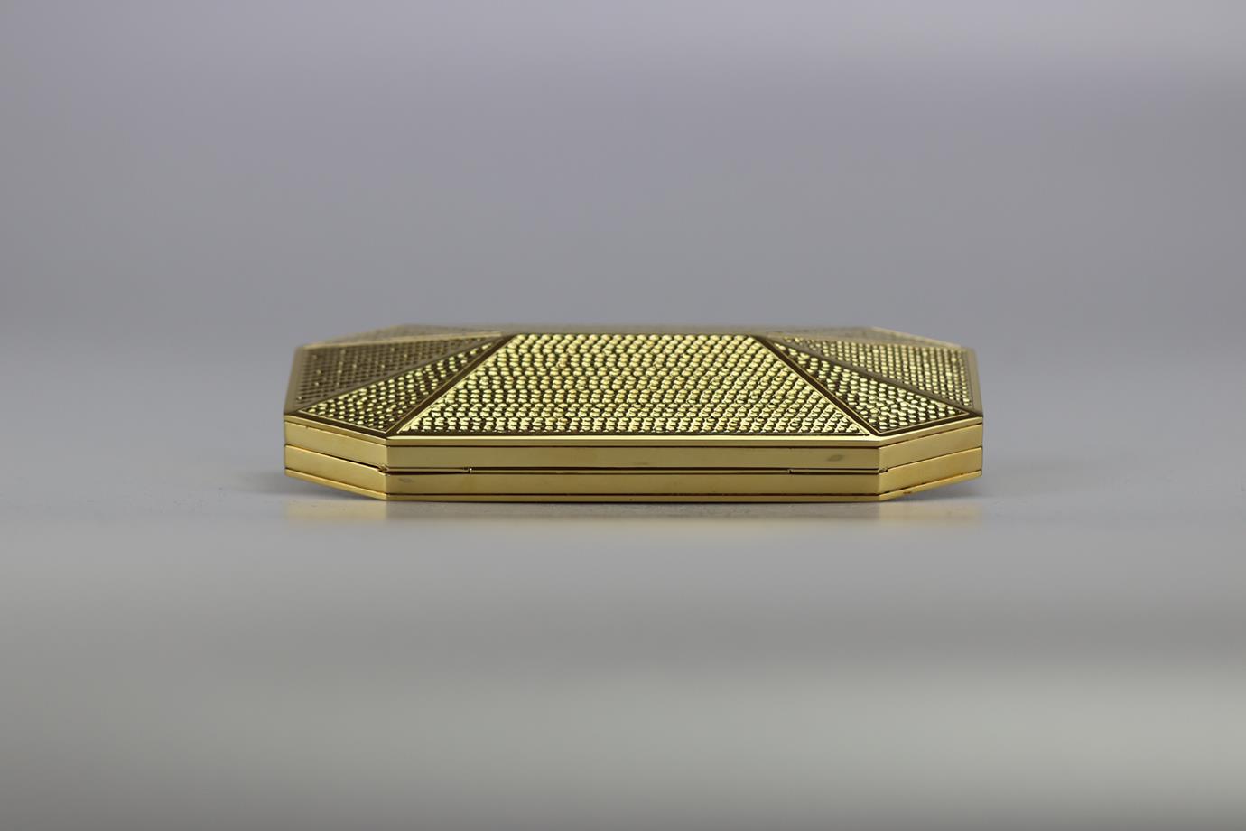 STARK EMBOSSED GOLD TONE CLUTCH