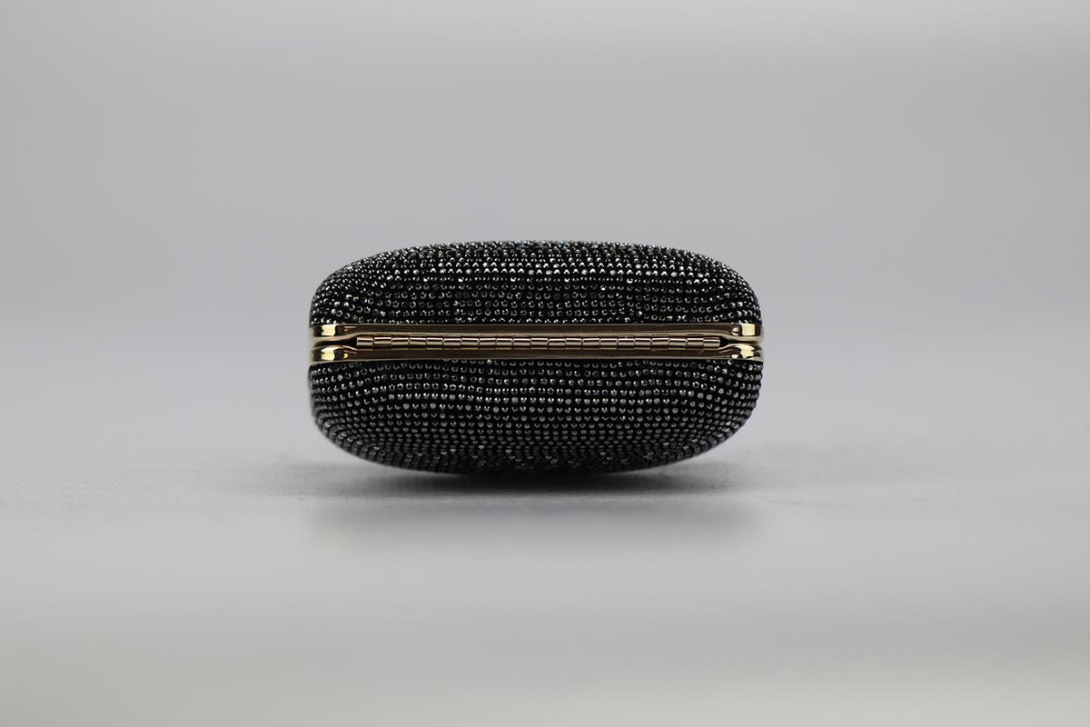 STARK CRYSTAL EMBELLISHED SUEDE AND SILVER TONE CLUTCH