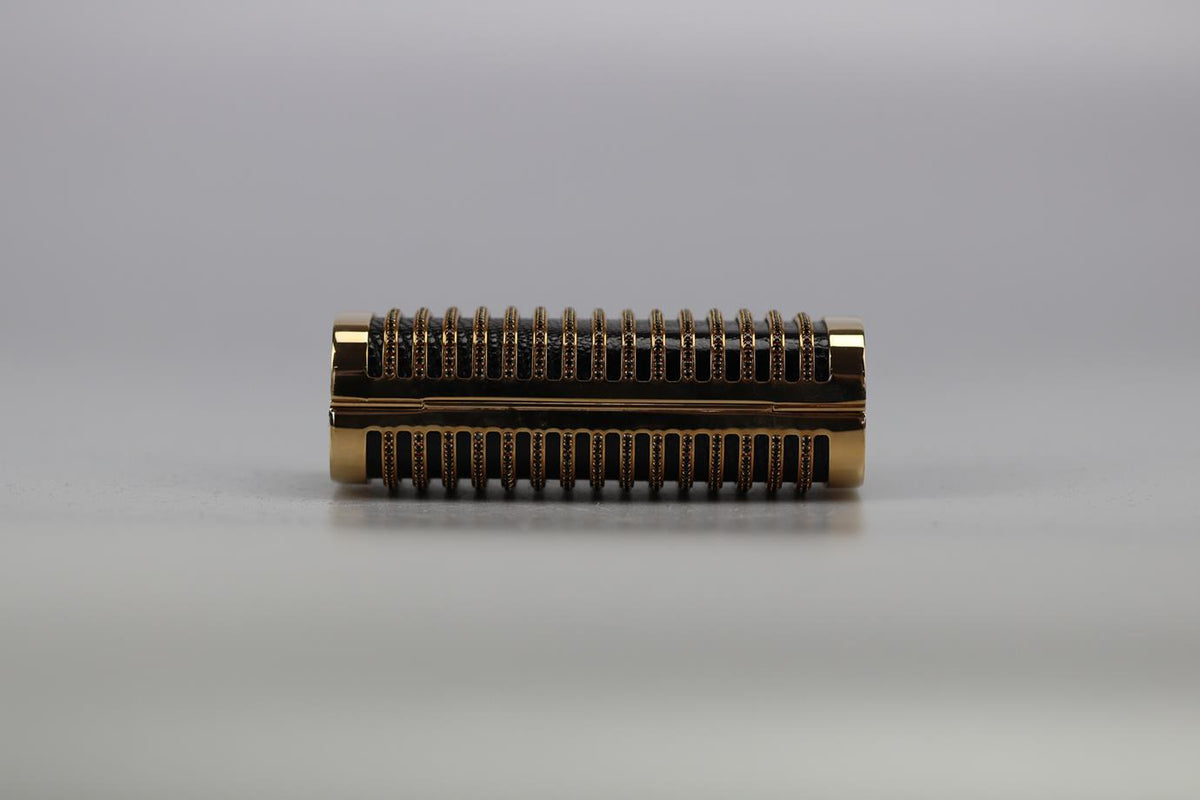 STARK CRYSTAL EMBELLISHED PYTHON AND GOLD TONE CLUTCH