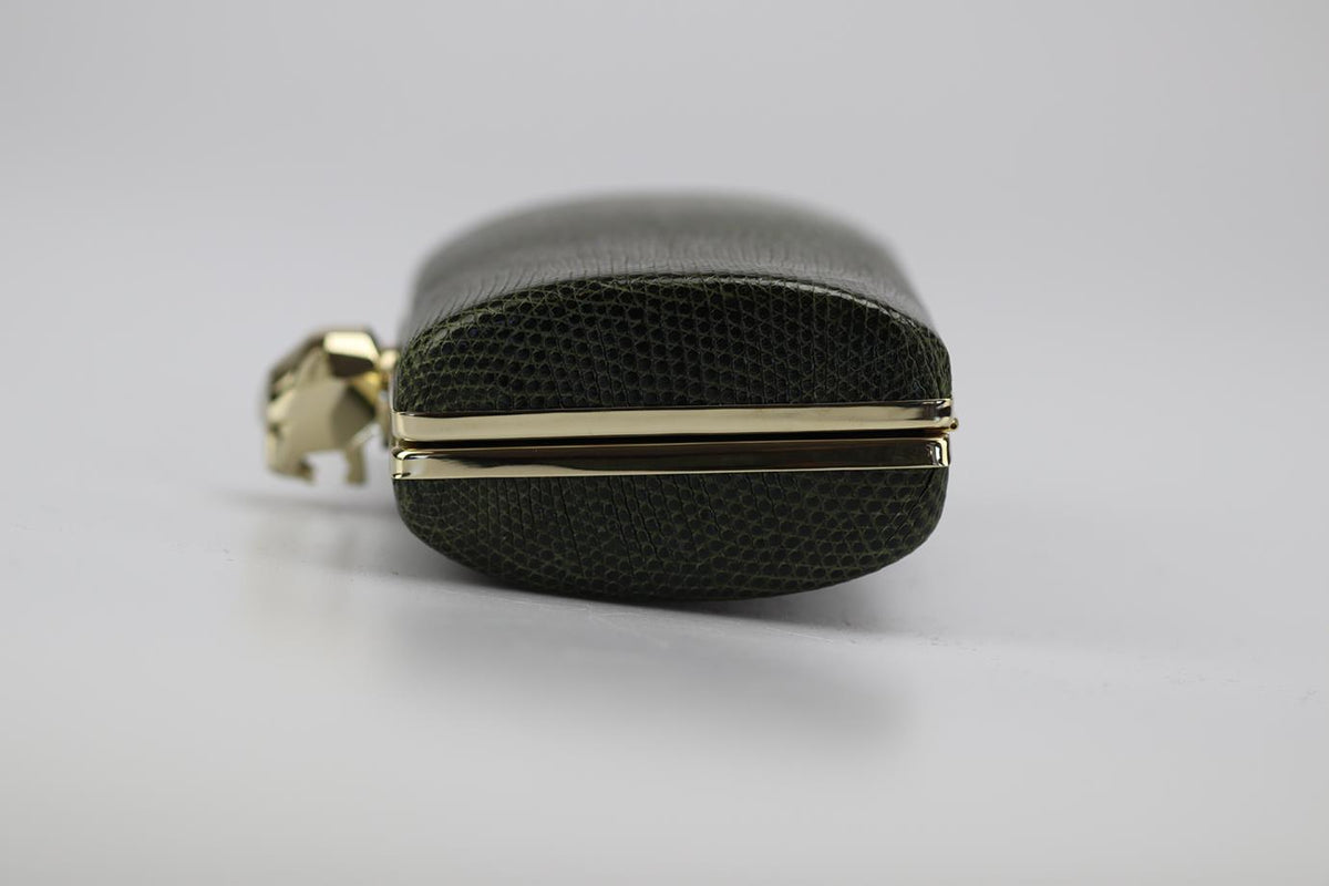 STARK SNAKESKIN AND SILVER TONE CLUTCH