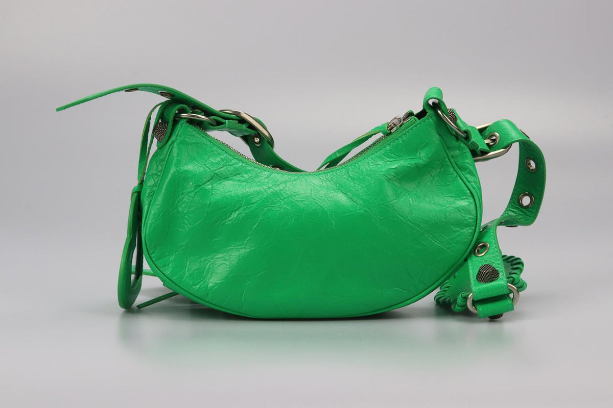 BALENCIAGA LE CAGOLE XS STUDDED CRINKLED LEATHER SHOULDER BAG