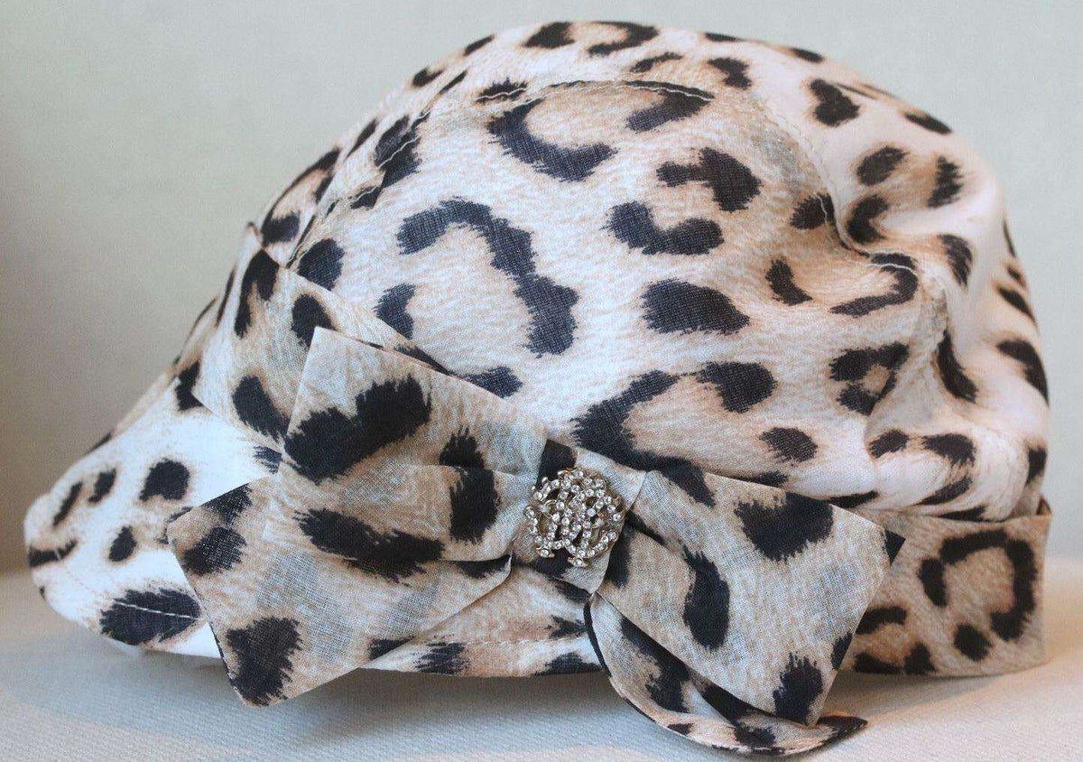 ROBERTO CAVALLI BABY JAGUAR PRINT HAT 12-24 MONTHS