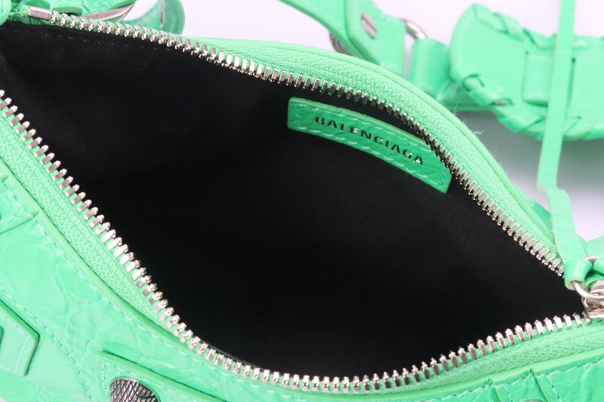 BALENCIAGA LE CAGOLE XS STUDDED CRINKLED LEATHER SHOULDER BAG